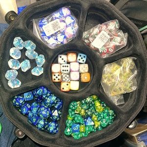 D&D game dice case with snapping lid carry case and numerous dice